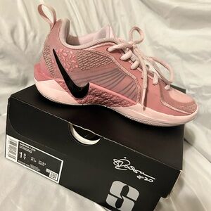 Nike Pink Low-Top Athletic Shoe with Black Swoosh